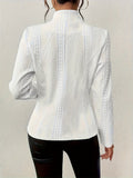 Whitney | Midje-definerende teksturert blazer