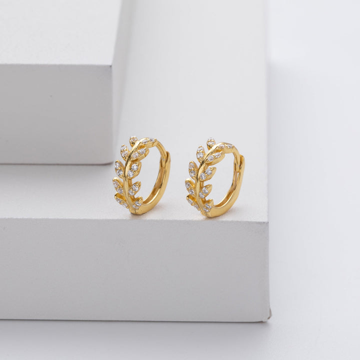 Diana | Elegante sølv- og gullbladøreringer